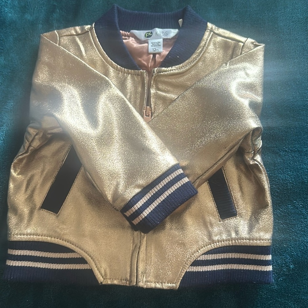 Baby girls rose gold and navy bomber jacket slight markings pictured